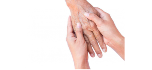 Hands of senior person with young caregiver